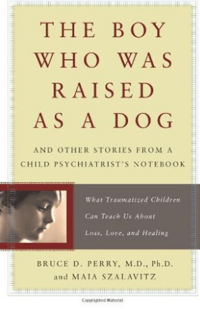 boy raised by dog.png